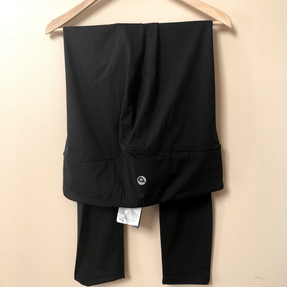 New with tags high rise athletic/yoga leggings.  Size XXL.  Solid black color.